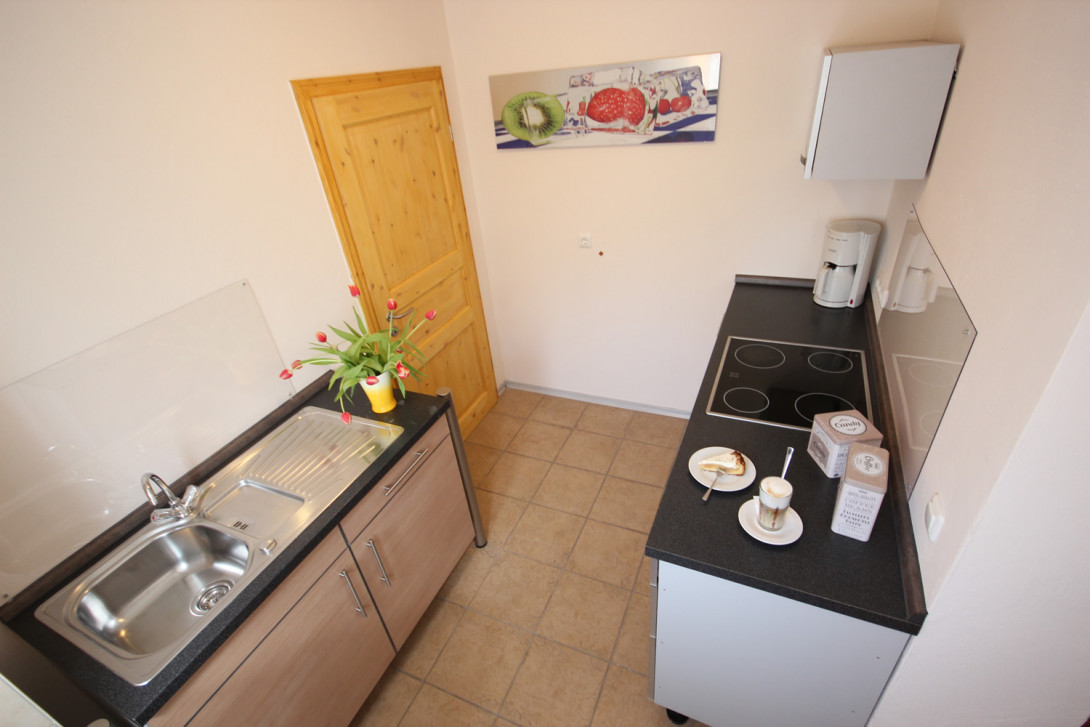 Funktional eingerichtete Küche, Foto: Denise Eggenstein